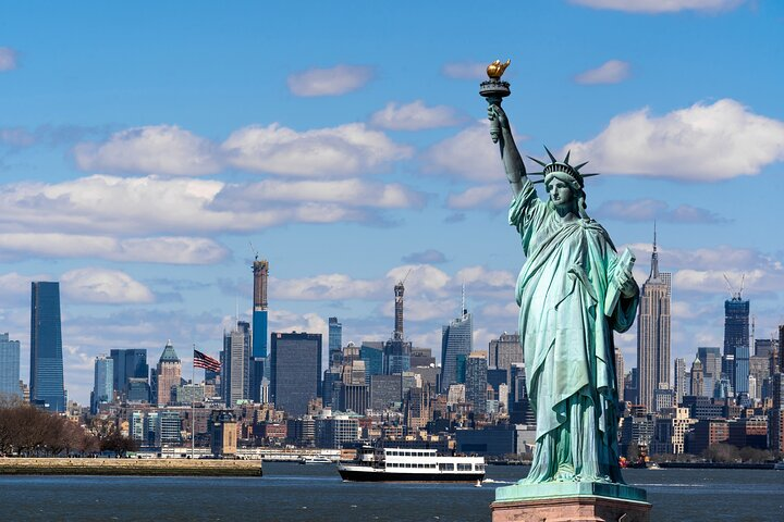 Experience the rich history of the Statue of Liberty and the poignant stories of Ellis Island. Enjoy stunning views as you explore these iconic landmarks and their significance to American heritage.